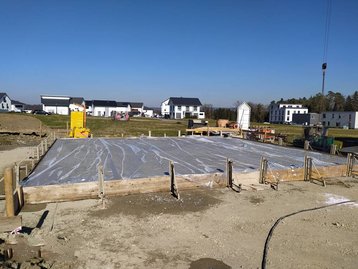 Bau einer neuen Bodenplatte für ein Raumwunder 100